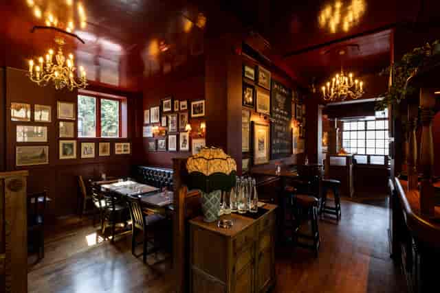 The Dining Room at Tower Bridge Arms: elegant pub interior for private events and networking.