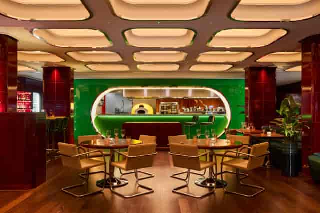 Motorino mid-century modern breakout space for professional networking and corporate events.