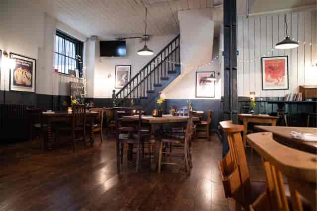 Rustic Shaws Booksellers venue with flexible seating for small social gatherings and events.