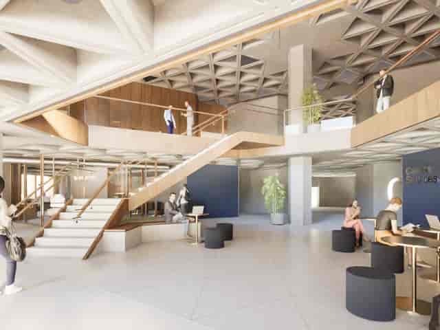 Modern library atrium, ideal for small networking events and professional breakout sessions.
