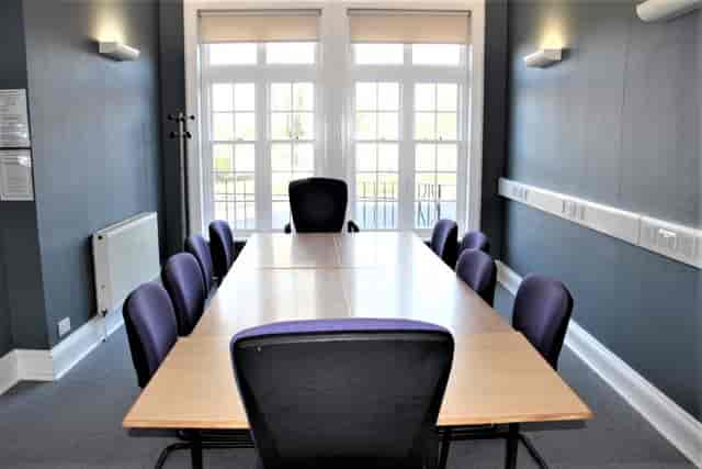 Small Ealing Central Library boardroom with natural light for team meetings and briefings.