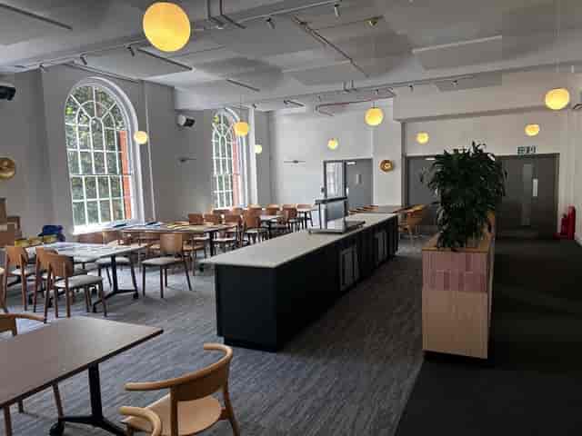 Sakura Cafe Woburn House: Modern event space with banquet seating for corporate networking lunches.