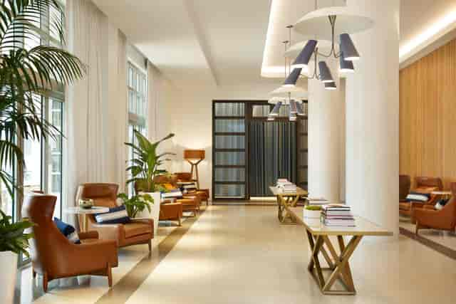 Riviera pre-function area at Cadillac Hotel for upscale corporate registration and networking.