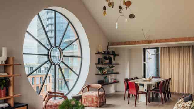 Main Space board meeting room with iconic architectural window for VIP private dining events.