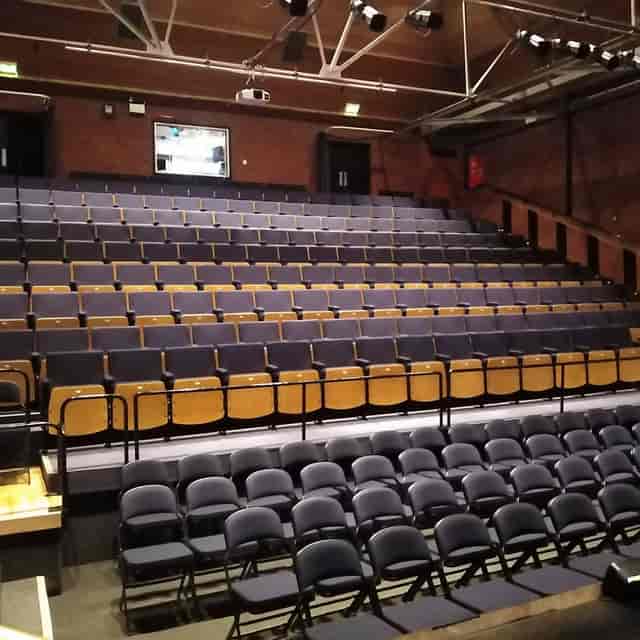 Stantonbury Theatre tiered auditorium for high-capacity plenary sessions and corporate keynotes.