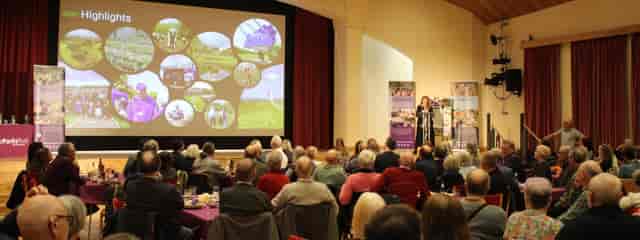 Main Theatre event with branded stage setup for professional corporate presentations.