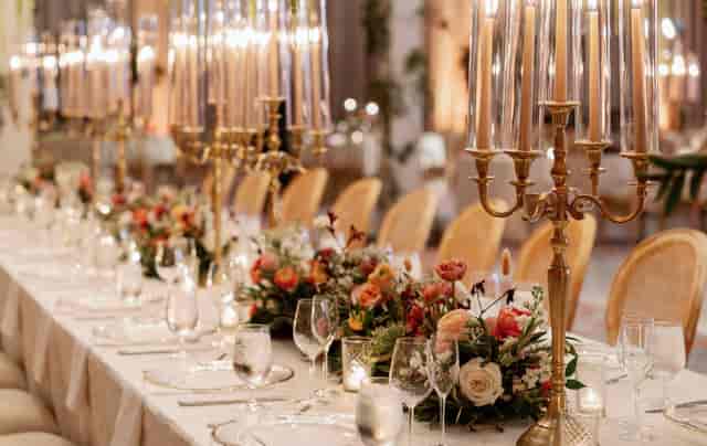 Gold candelabra tablescape at Grand Cypress Ballroom for luxury gala event decor.