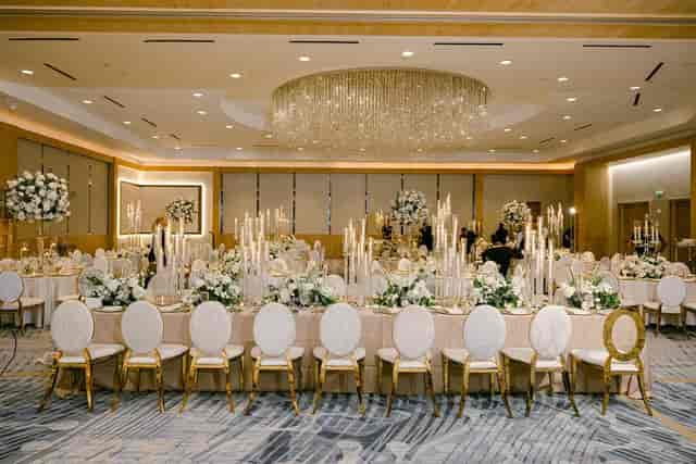 Royal Palm Room gala ballroom with gold chairs, ideal for luxury events and wedding receptions.