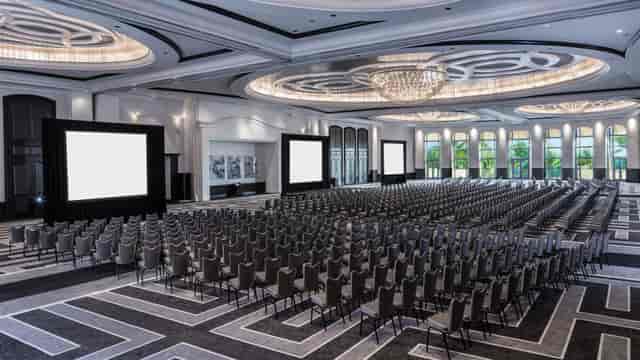 Americana Ballroom theater setup for corporate keynotes and large-scale plenary sessions.