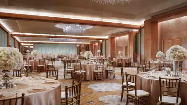 Luxury ballroom at The Ritz-Carlton, Fort Lauderdale, featuring tiered lighting for weddings or galas.