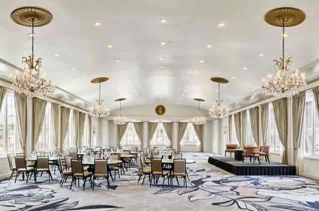 Grand Ballroom at The Ritz-Carlton Fort Lauderdale with elegant chandeliers for corporate events.