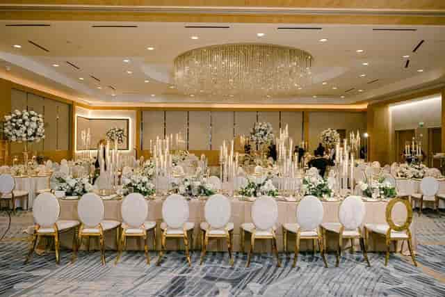 Upscale Ritz-Carlton, Fort Lauderdale ballroom with candle centerpieces for gala wedding events.
