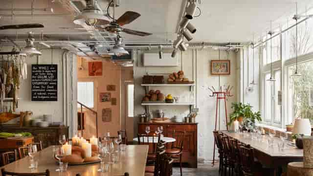 Rustic-chic private dining room at The Kitchen, perfect for intimate events and team dinners.