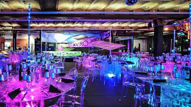 Revolution Manchester Gallery: Modern event space with iconic aircraft and LED lighting for hire.