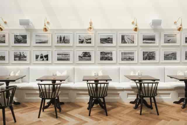 Slice Café Bar in Middleton Arena: Modern banquette seating for networking events and meetings.
