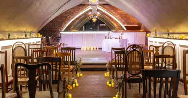 Civic Hall Ashton: Vaulted brick boutique wedding venue with unique seating.