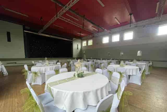 Medlock Suite banquet hall with bold red industrial ceiling for wedding or formal event venue.