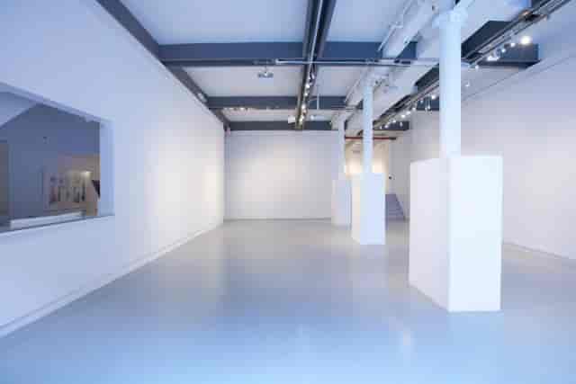 Minimalist industrial gallery space at Canvas Studios for brand activations and networking events.