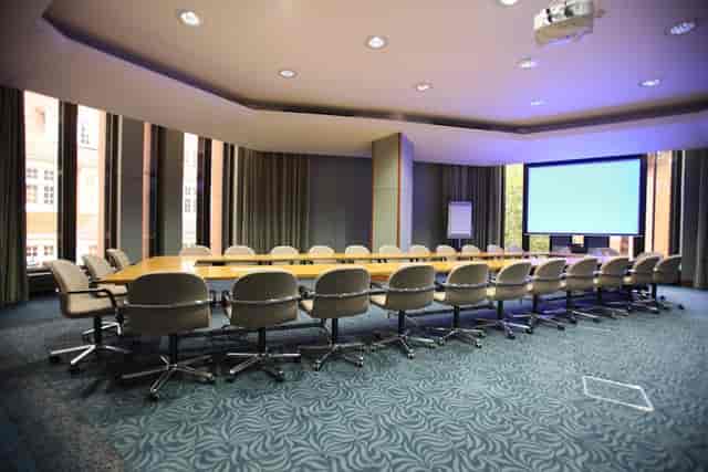 Boardroom setup in Room 2, Therapy Spaces Putney for professional meetings and corporate events.