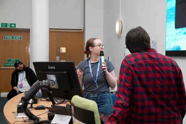 Portland Building Q&A session with lectern for academic conferences and university events.