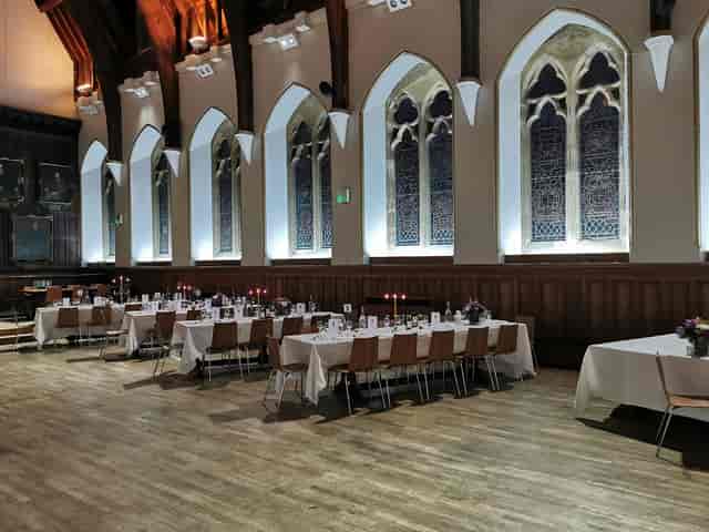 Lancing College dining hall with banquet seating for historic wedding and event venue rental.