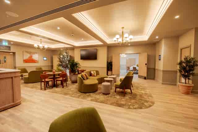 Trafalgar Square hotel pre-function area with tiered lounge seating for networking and breakouts.