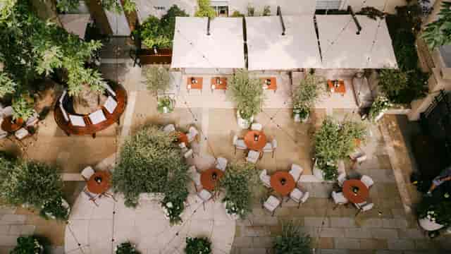 Outdoor event venue at Sale e Pepe Terrazza with lounge seating for networking and receptions.
