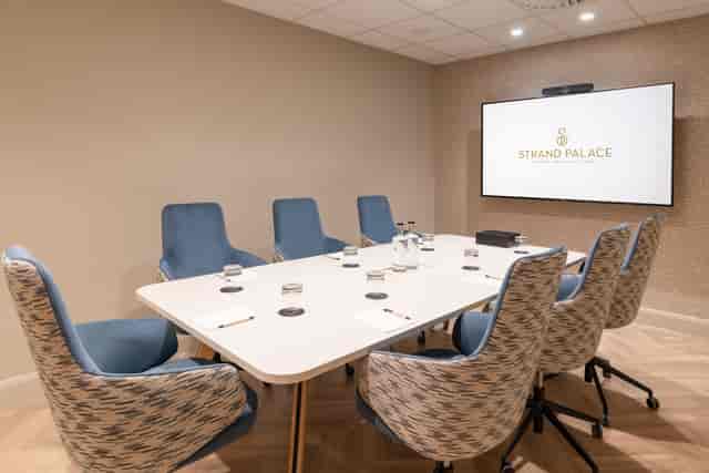 Modern Soho boardroom with high-contrast seating for business meetings and corporate events.