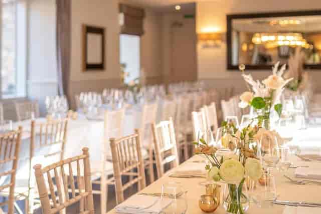 Monadh Restaurant formal banquet setup with Chiavari chairs for wedding reception or event dinner.