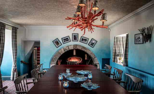 Glenmorangie Private Room with statement chandelier for executive retreats and VIP boardroom dinners.