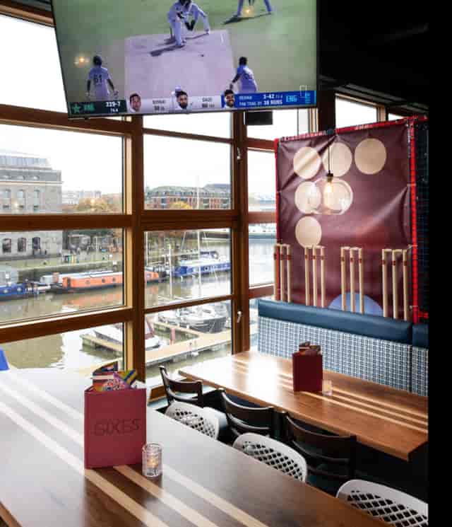 Sixes Bristol corporate event venue with cricket simulator for team building and social gatherings.