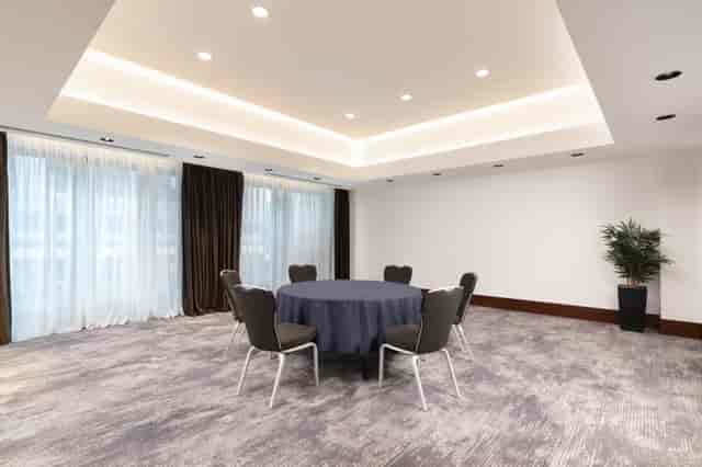 Hilton London Metropole Mezzanine meeting room with natural light for board meetings and events.