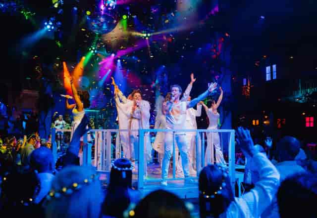 Immersive Laban stage production with lighting for high-energy corporate event and gala.