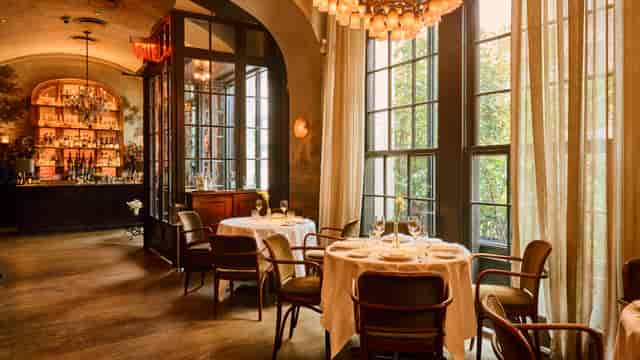 Elegant Main Room dining space for executive luncheons and VIP events.
