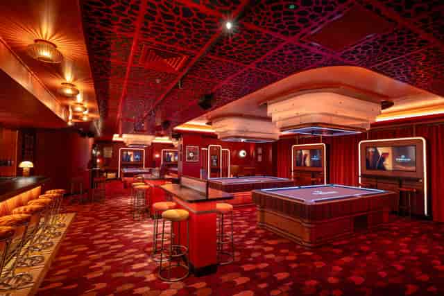 Main Room venue in Lafayette with gaming tables for corporate events and private receptions.