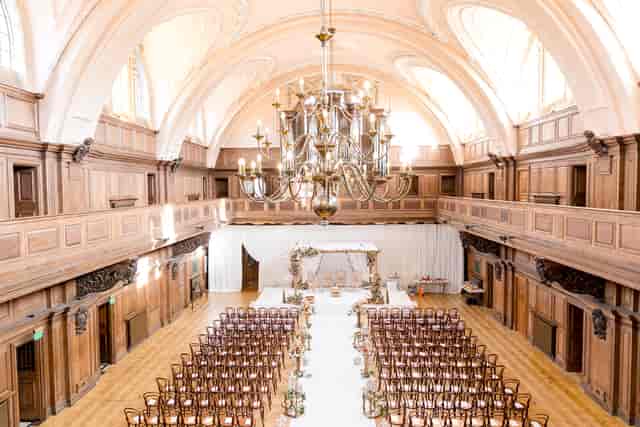 Historic Lafayette event venue with dramatic chandelier, perfect for formal wedding ceremonies.