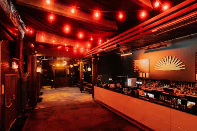 Industrial bar and courtyard space for exclusive evening receptions and brand activations.