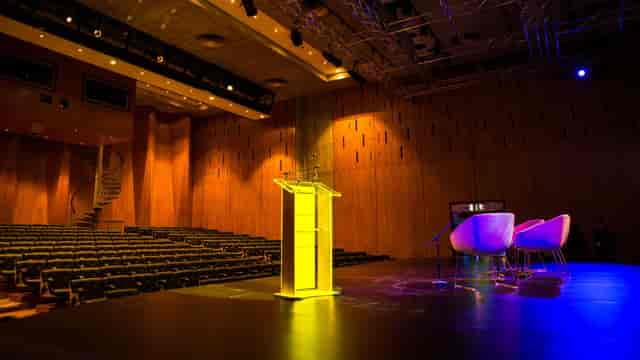 Highgate School AV room auditorium for hybrid events and professional panel discussions.