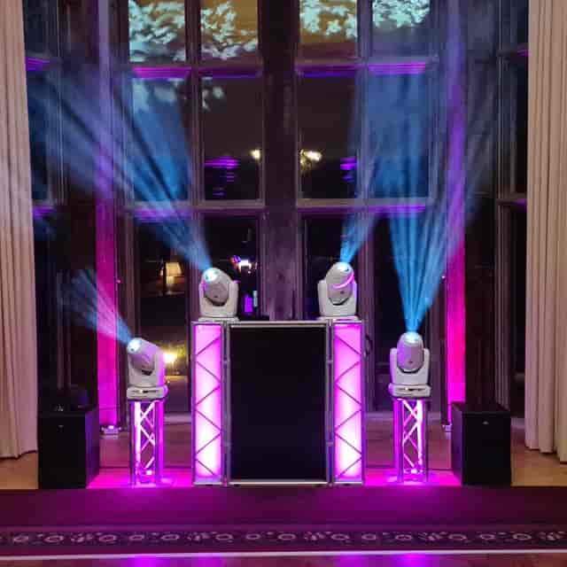 DJ booth and intelligent lighting at Stantonbury Theatre for high-energy dance and stage events.