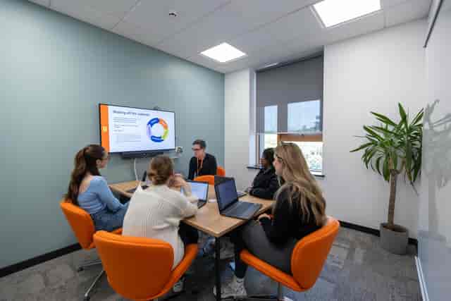 Small meeting room at The Chaffron Centre with hybrid AV setup for professional conferences.