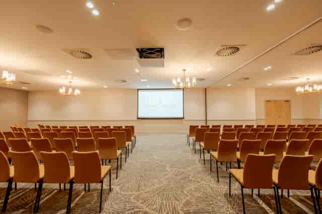 Covent Garden Suite theater-style meeting room setup for professional seminars and presentations.