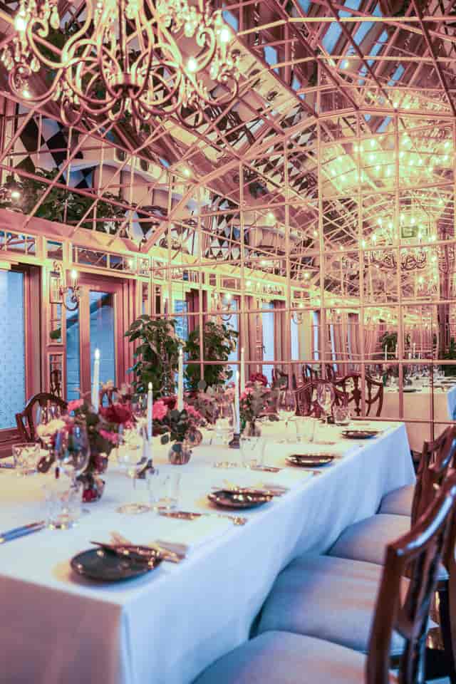 The Mirror Room at 11 Cadogan Gardens featuring elegant floral decor for private gala celebrations.
