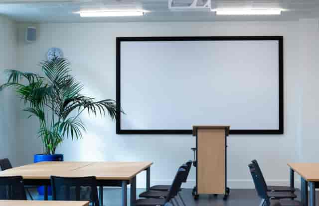 Greenwood Centre conference room with central lectern for seminars and training workshops.