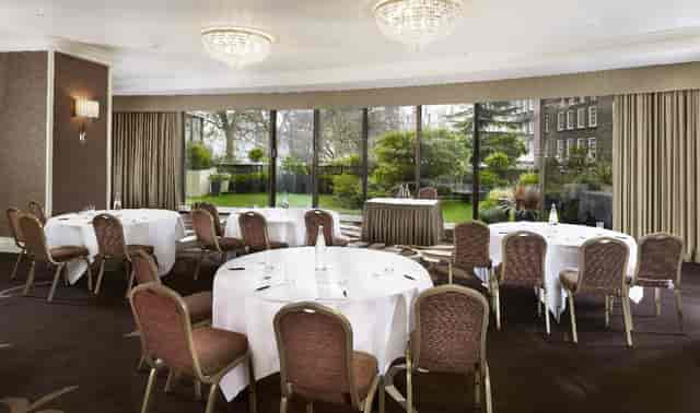 The Trianon at Park Tower Knightsbridge with floor-to-ceiling windows for corporate workshops.