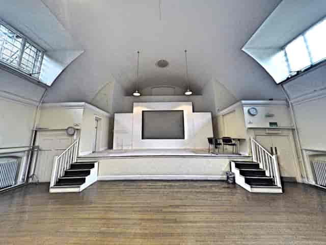 Mary Ward Hall stage in Mary Ward House, ideal for community events and small presentations.