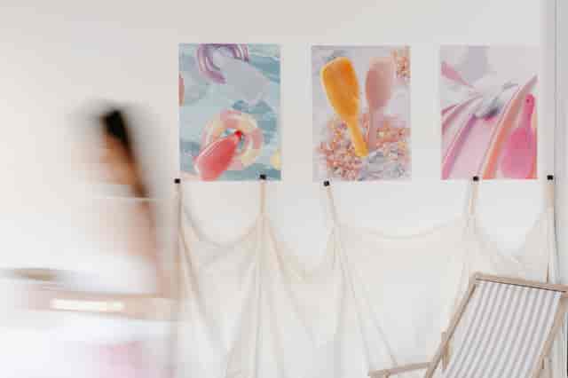 DIY experiential event setup at OXO2 featuring mismatched fabric draping and uneven visuals.
