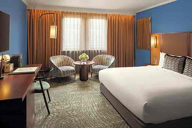 St. Pancras hotel room with workspace for business meetings and corporate event accommodation.