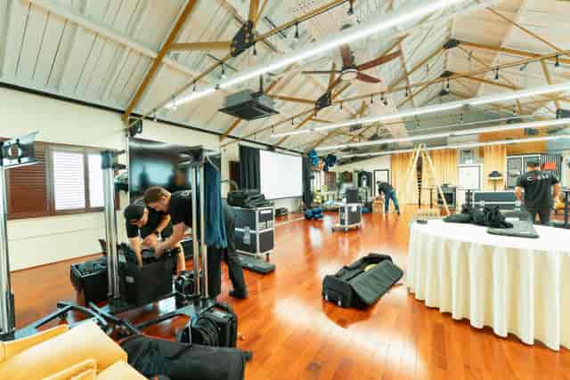 AV technicians setting up professional lighting and gear for a Lumiere Underwood event.