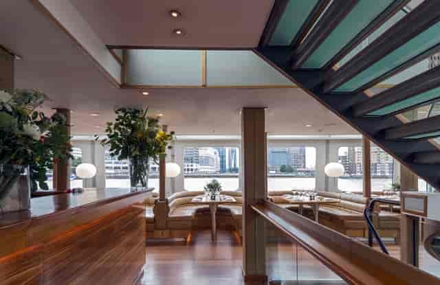 Woods Quay Silver Sturgeon vessel for corporate dinners and networking events with wood decor.