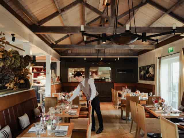 Private dining room at Skew with vaulted timber ceilings, ideal for corporate events and dinners.